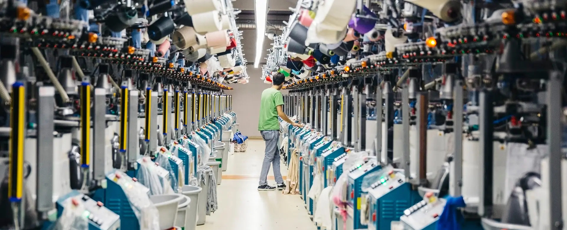 Sock production machines and yarn mills in a textile factory