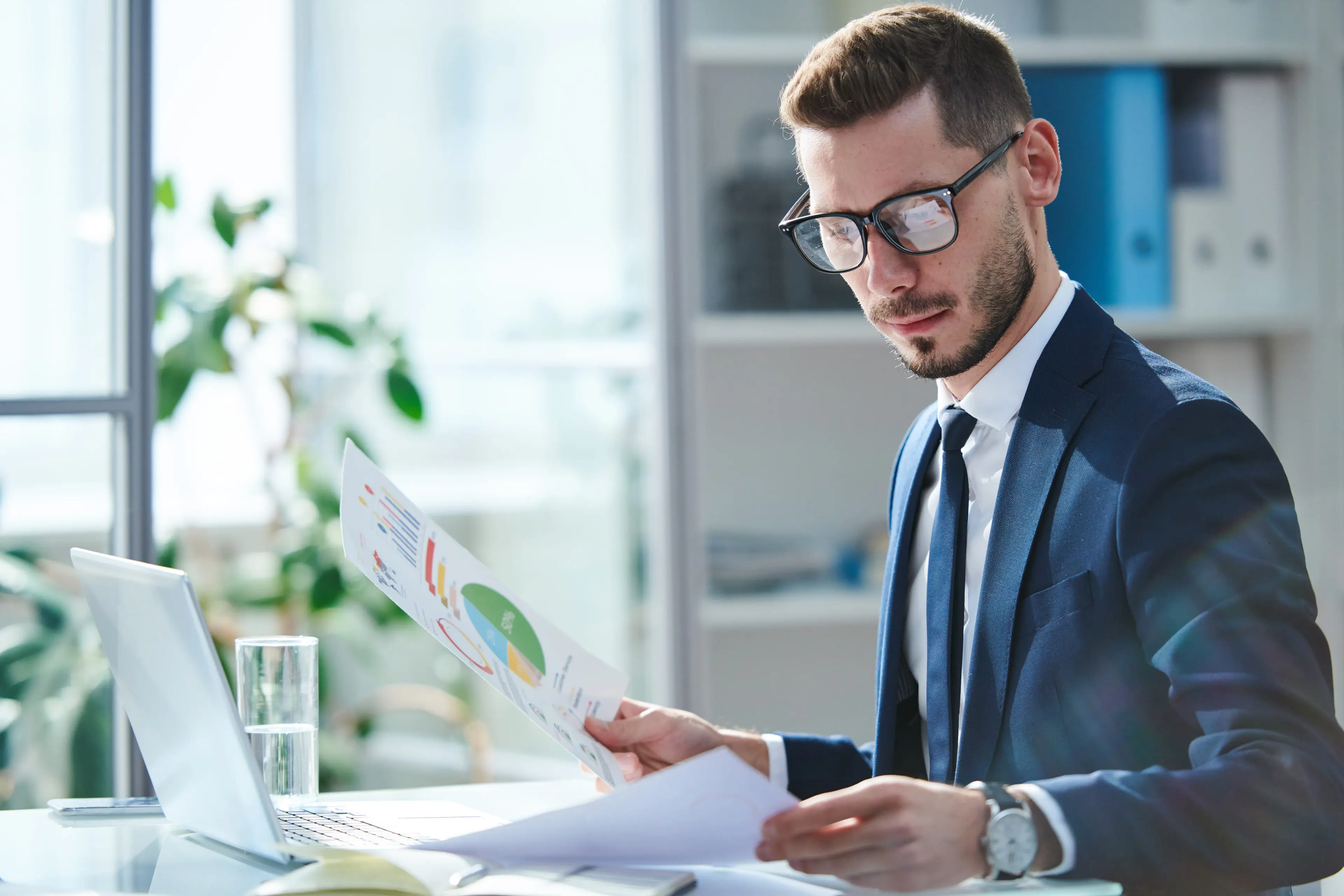 Financial director reviewing business data in an office