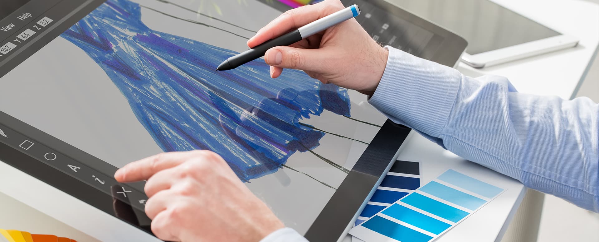 Apparel designer designing a dress