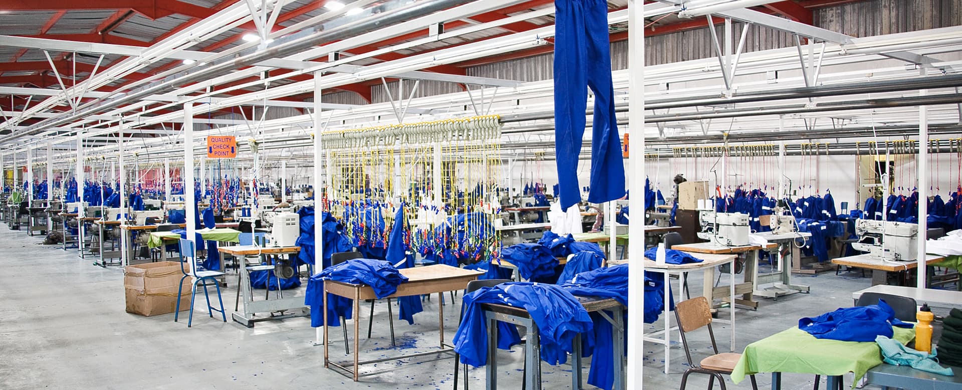 Industrial textile machines operating inside a fabric factory