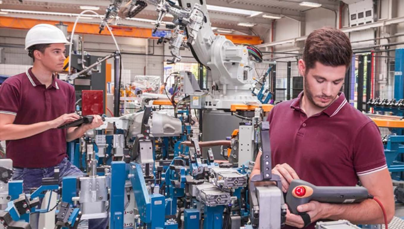 Zwei Männer mit einer elektrischen Maschine