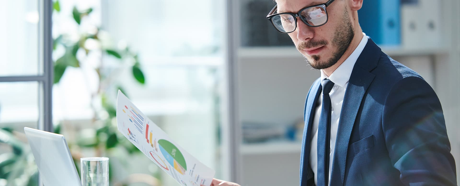 Financial director reviewing business data in an office